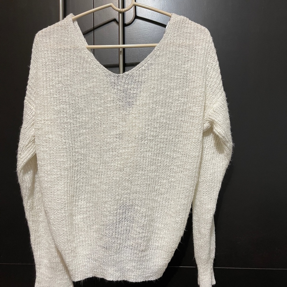 White blouse with twist tie in the back